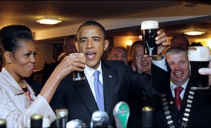 president obama toasts with guinness in hand