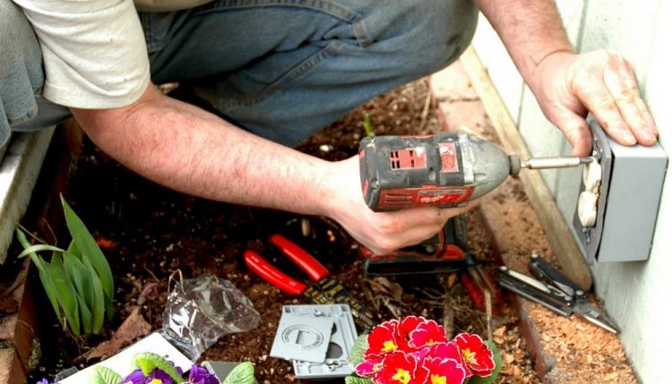 electrician at work - how much do electricians charge