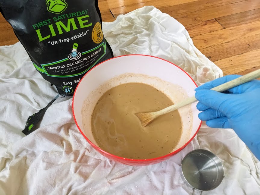 whitewash recipe - mixing hydrated lime whitewash brick fireplace