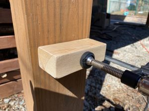 foot block attached to deck post