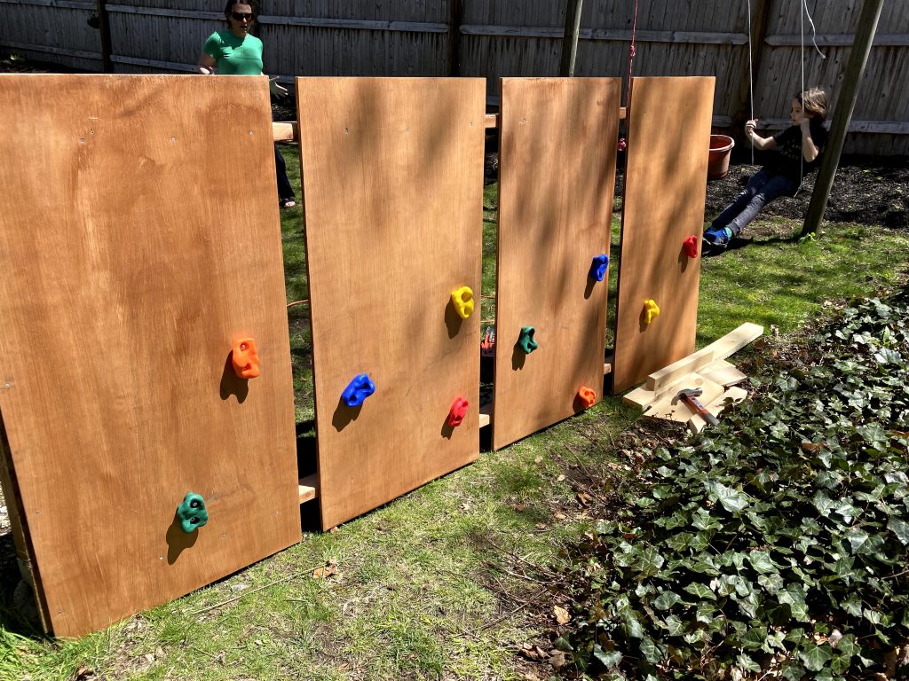 how to make a DIY rock climbing wall with 2x4 sheets of plywood