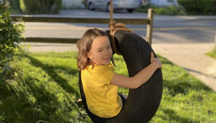 how to make a tire swing - genny tries out the tire swing and approves