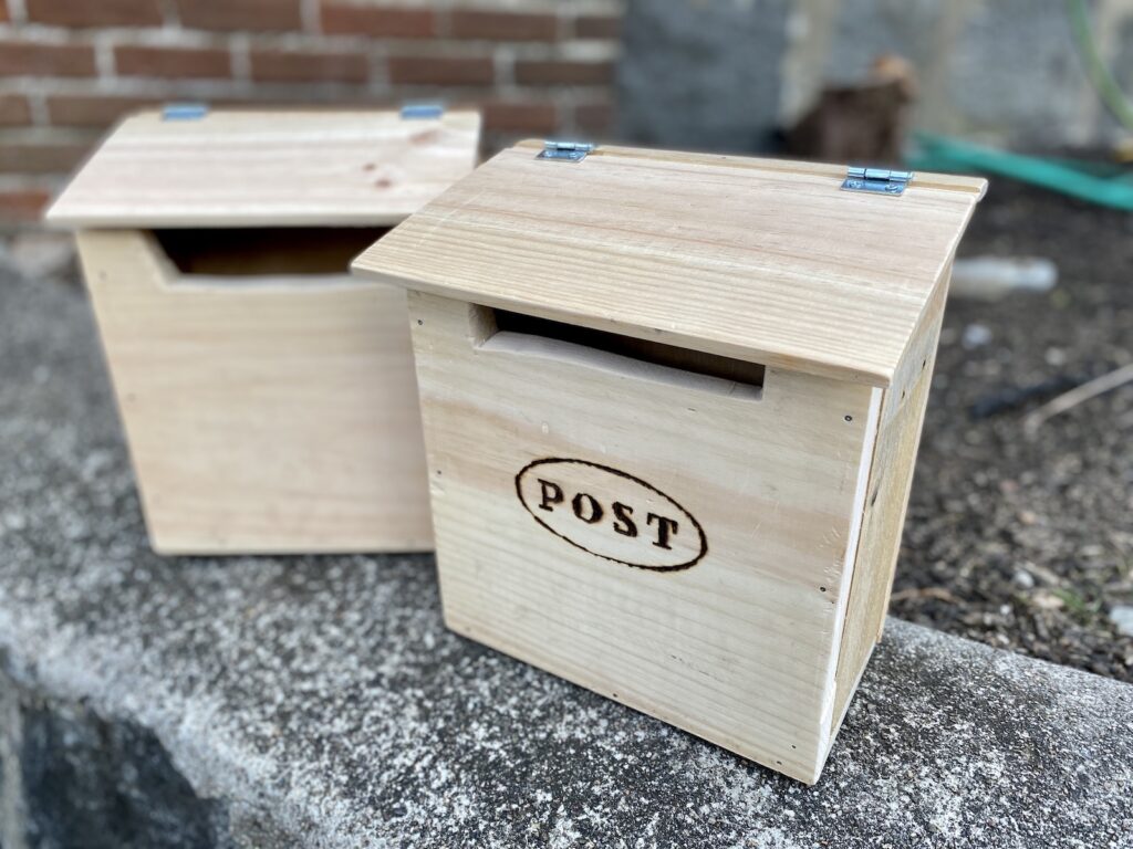 DIY mailbox with "post" engraved, unfinished wood